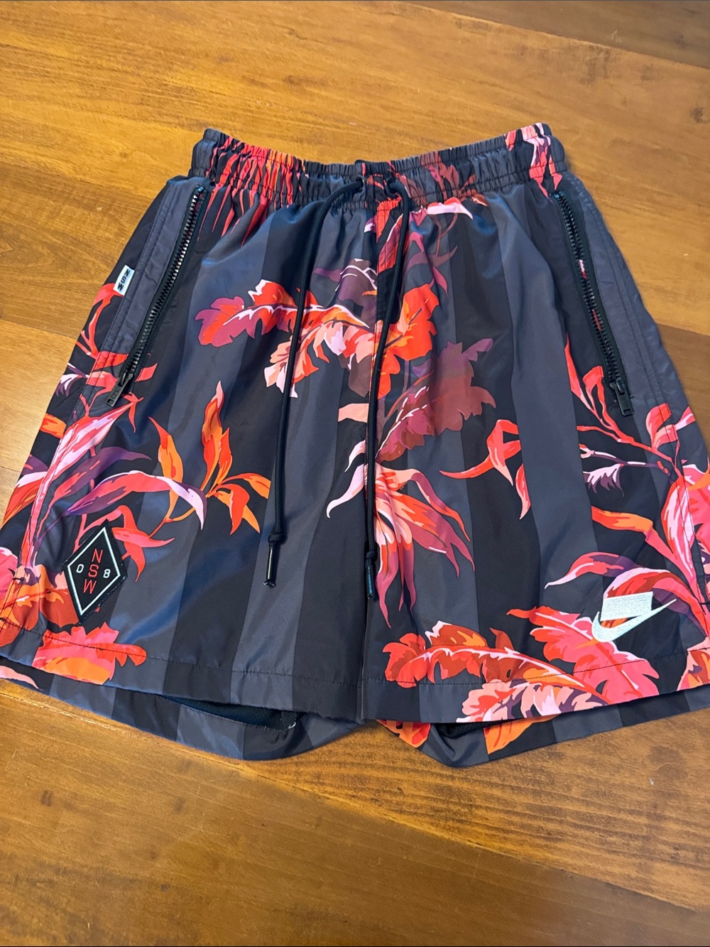 Nike Men’s Navy Swim Trunks with Red, Pink and Orange Floral Print